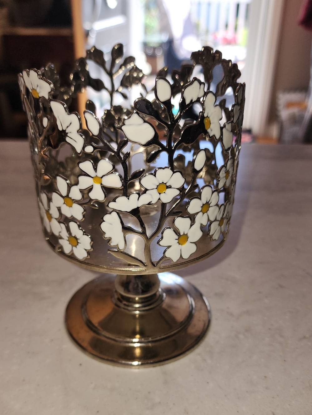 Floral Cutout Metal Pedestal Candle Holder in White and Gold